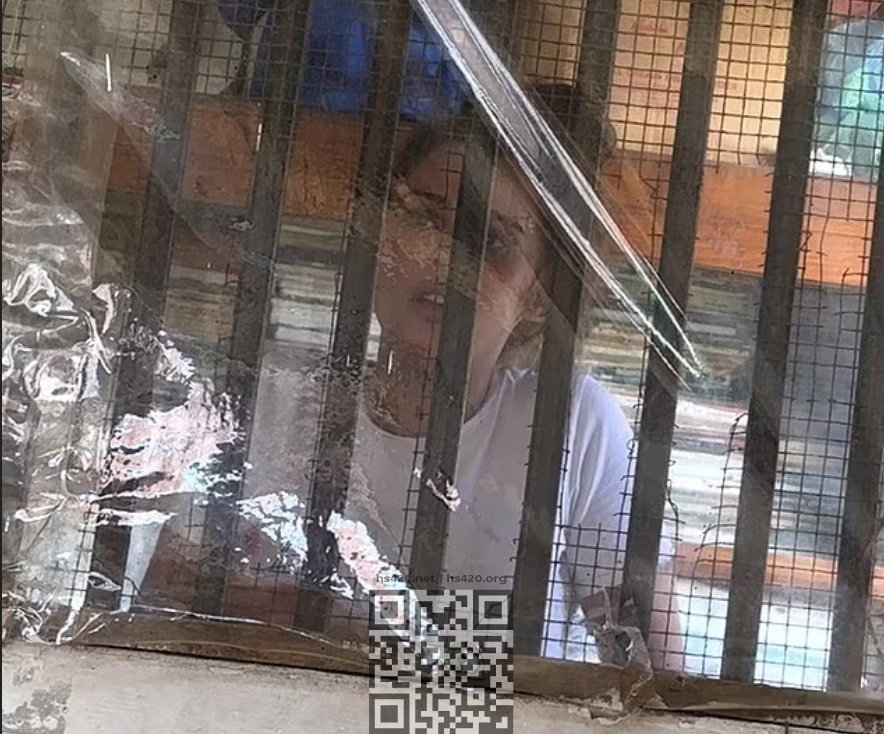 charlotte-lee-behind-bars.jpg