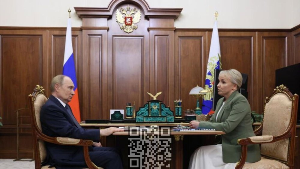 putin-with-kostyuk.jpg
